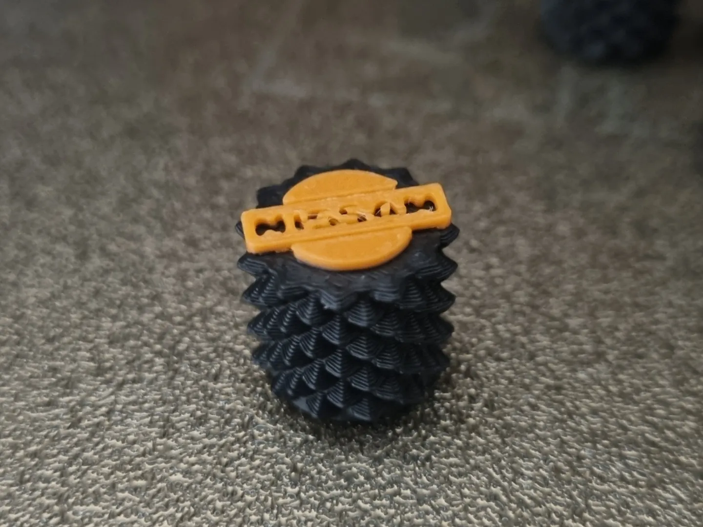 Tire valve cap NISSAN logo