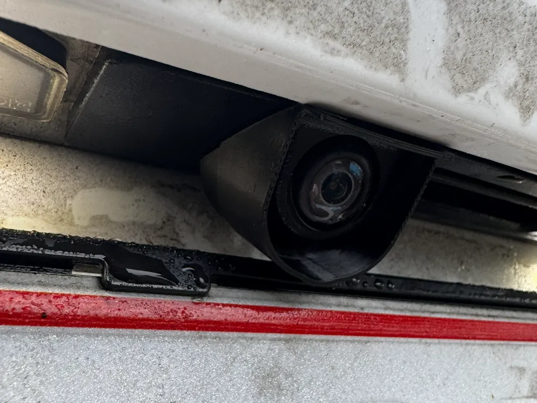 Tesla rear camera shield